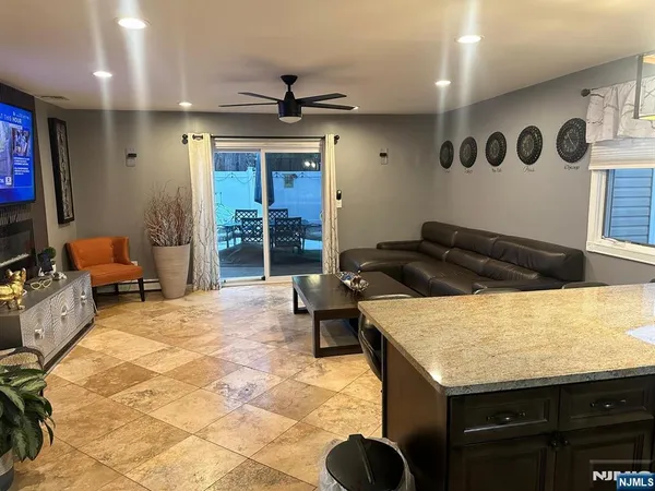 a kitchen with a stove and a refrigerator