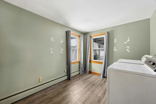 a view of livingroom with washer and dryer
