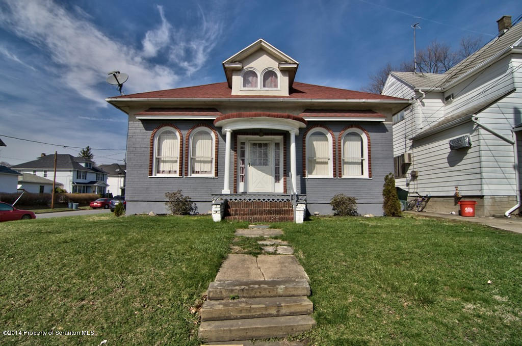 2001 Green Ridge Street Dunmore, PA 18512 - Photo 1 of 40 a front view of a house with a yard