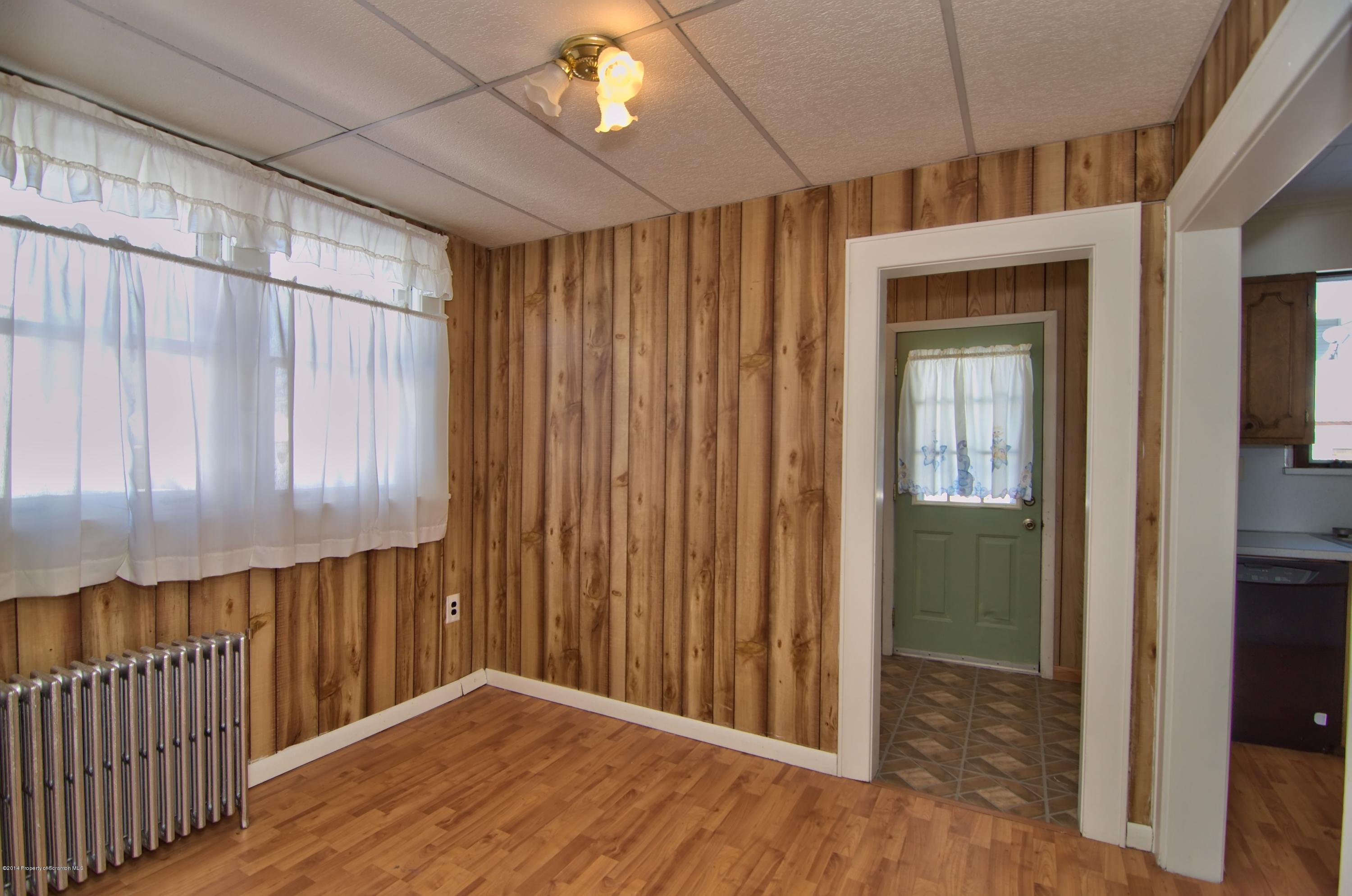 2001 Green Ridge Street Dunmore, PA 18512 - Photo 16 of 40 a view of a hallway with wooden floor and staircase
