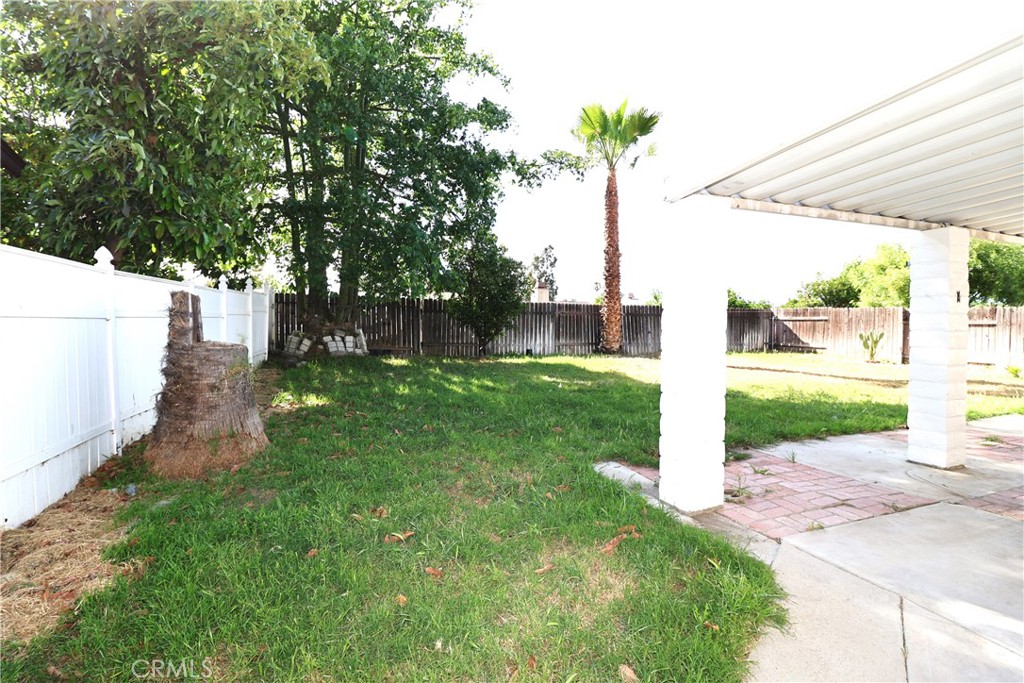 1161 Blue Ridge Lane Colton, CA 92324 - Photo 27 of 36 a view of a park with plants and large trees