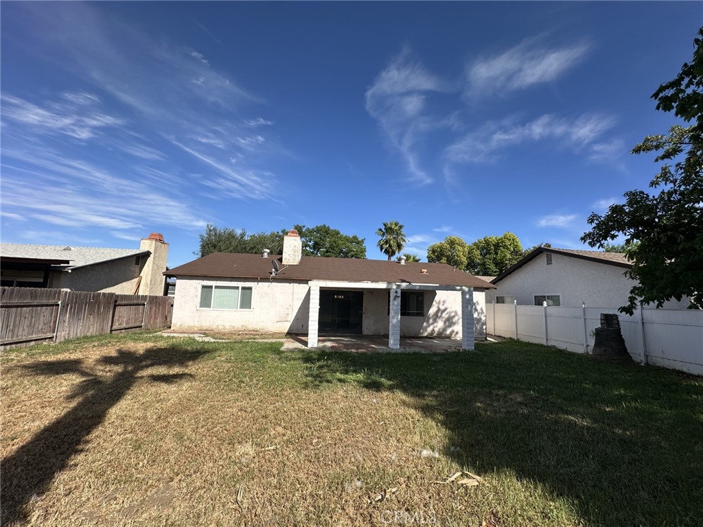 1161 Blue Ridge Lane Colton, CA 92324 - Photo 30 of 36 a front view of a house with a yard