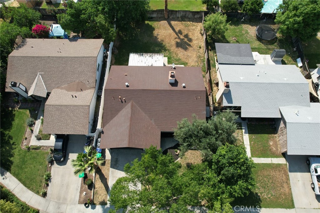 1161 Blue Ridge Lane Colton, CA 92324 - Photo 34 of 36 an aerial view of residential house with outdoor space and swimming pool