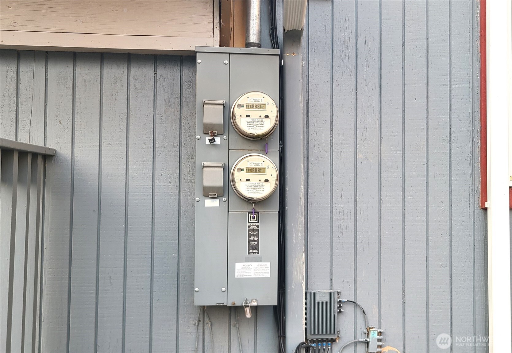 529 North 103rd Street Seattle, WA 98133 - Photo 22 of 22 a clock on a wall next to a window