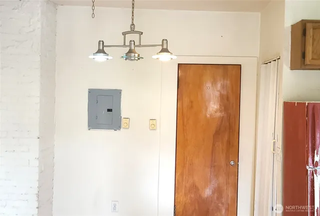 a bathroom with a shower and a sink