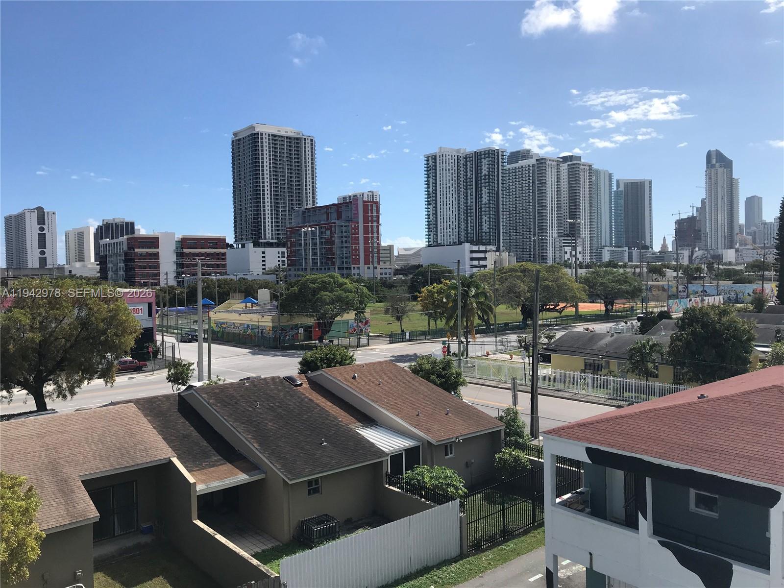 1815 Northwest 1st Court, Unit 2 Miami, FL 33136 - Photo 12 of 12 a view of a city with tall buildings