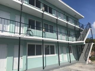 1815 Northwest 1st Court, Unit 2 Miami, FL 33136 - Photo 9 of 12 a view of an entrance of the building