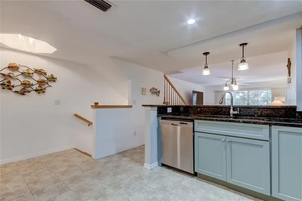 a view of a balcony door and living room