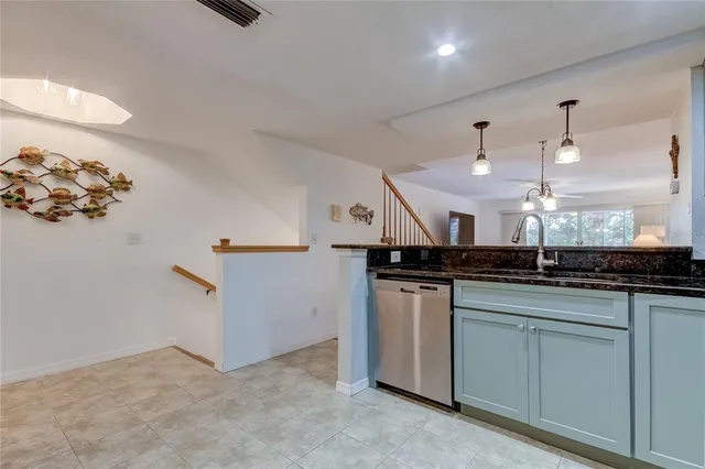 a view of a balcony door and living room