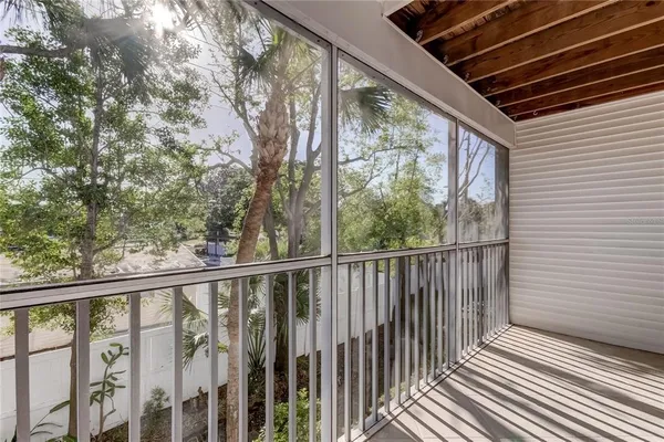 a view of a backyard with sitting area