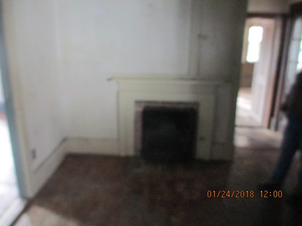 200 Greenwich Road Ware, MA 01082 - Photo 5 of 14 a view of a livingroom with an empty space and a fireplace