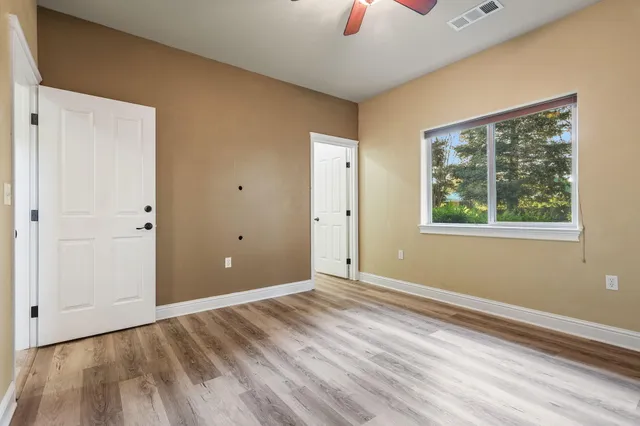 a view of an empty walk in closet