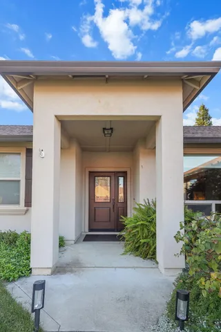 a front view of a house with porch