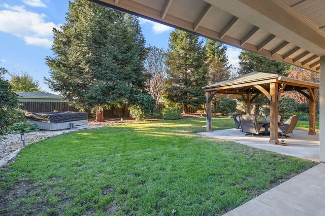 a view of a park with swings and slides