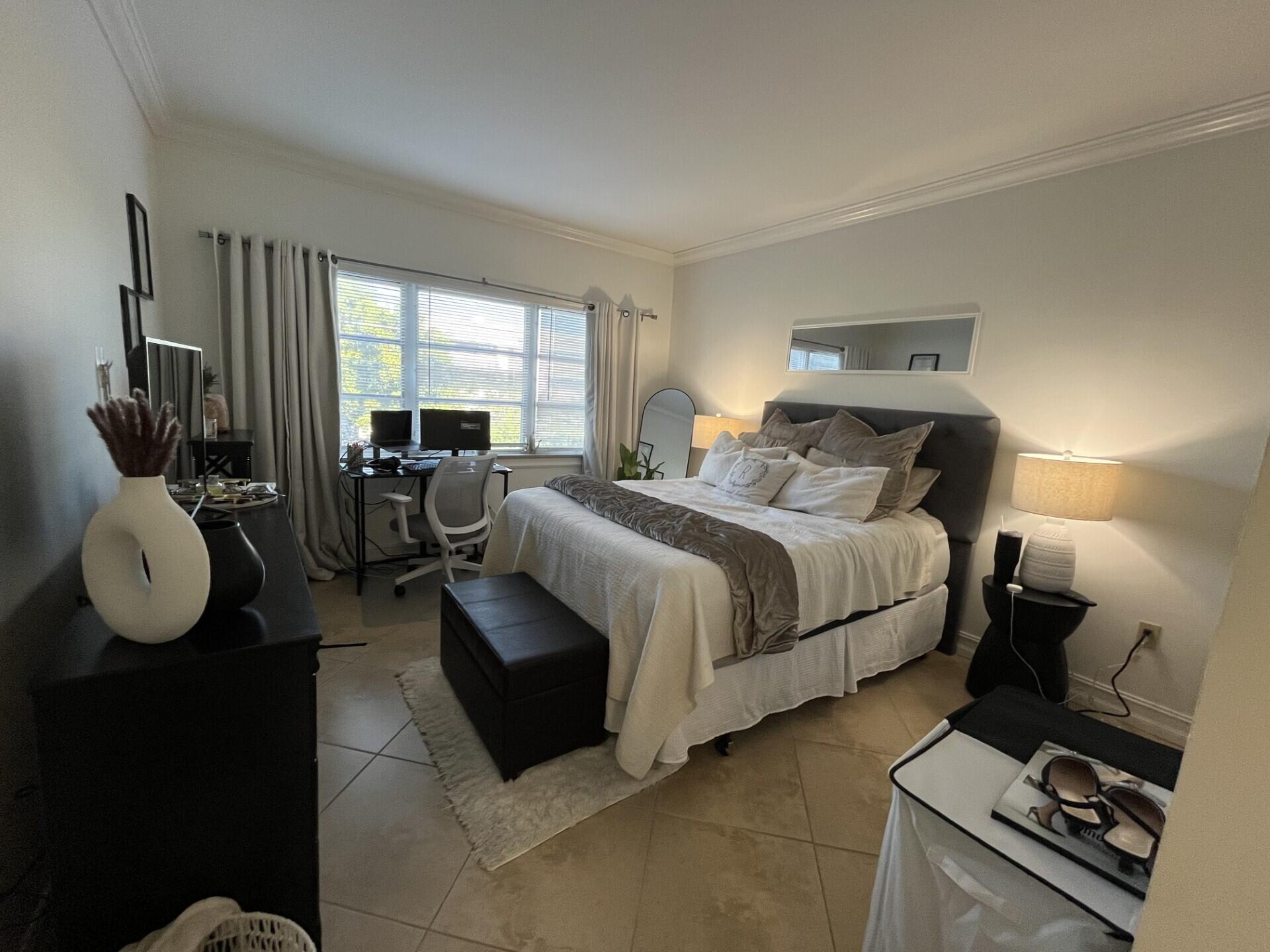55 Southwest 2nd Avenue, Unit 2030 Boca Raton, FL 33432 - Photo 8 of 14 55 SW 2nd 2030 Primary Bedroom