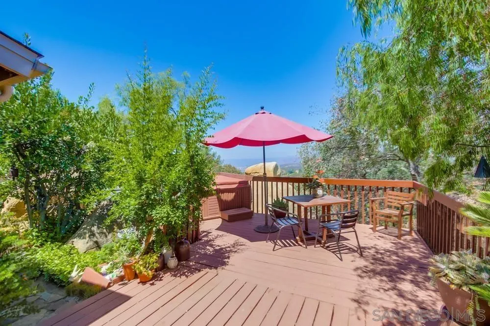 940 Mountain View Road El Cajon, CA 92021 - Photo 38 of 65 a view of a patio with furniture and a garden