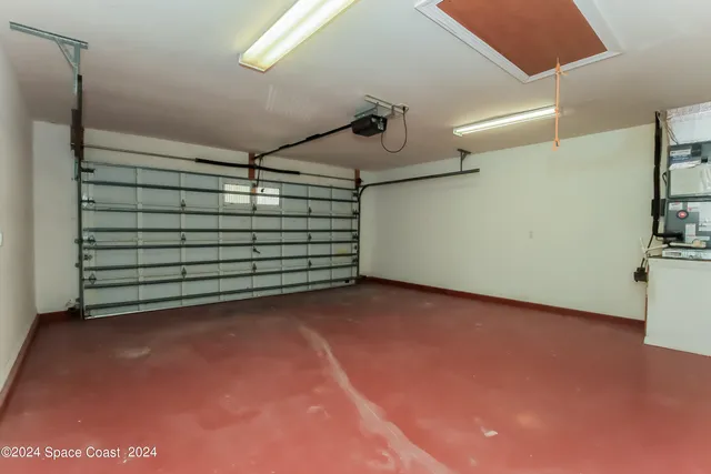 a view of empty room with garage