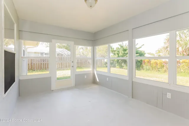 a living room with a large window