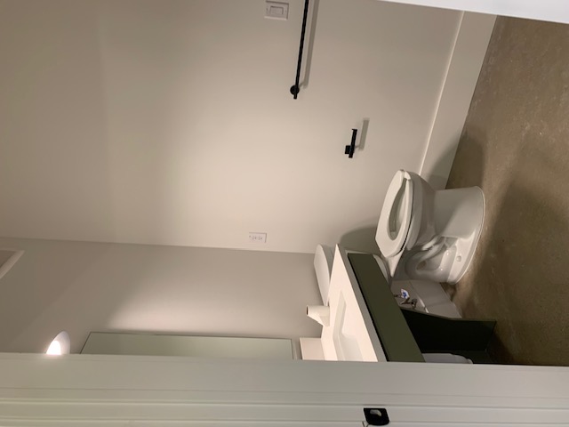 2800 Pearl Street Austin, TX 78705 - Photo 4 of 8 a bathroom with a toilet and a sink