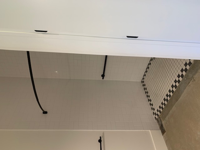 2800 Pearl Street Austin, TX 78705 - Photo 5 of 8 a bathroom with a granite countertop shower and a sink