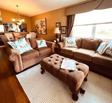 a living room with furniture and a couch