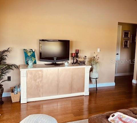 9320 Clubside Circle, Unit 2308 Sarasota, FL 34238 - Photo 20 of 51 a living room with furniture and a flat screen tv