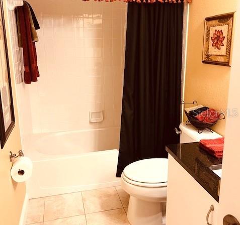 9320 Clubside Circle, Unit 2308 Sarasota, FL 34238 - Photo 27 of 51 a bathroom with a toilet and a shower