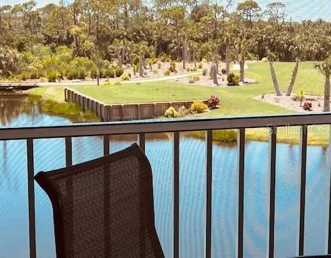 a view of swimming pool with an ocean view