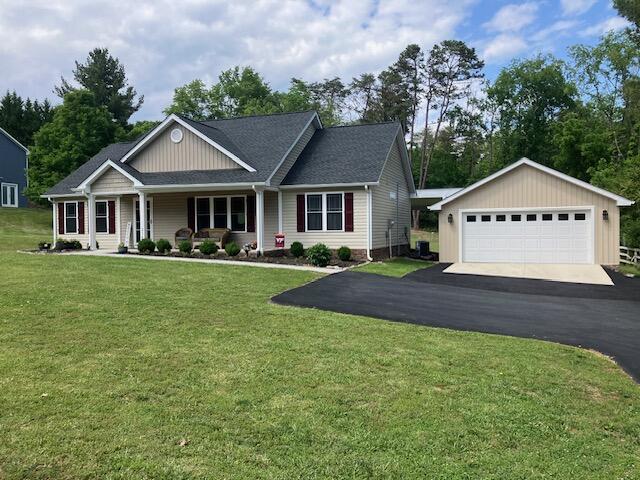 2348 East Ruritan Road Roanoke, VA 24012 - Photo 2 of 31 a front view of a house with a yard