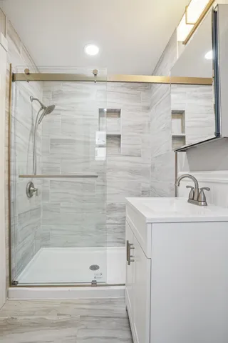 a bathroom with a sink and a mirror