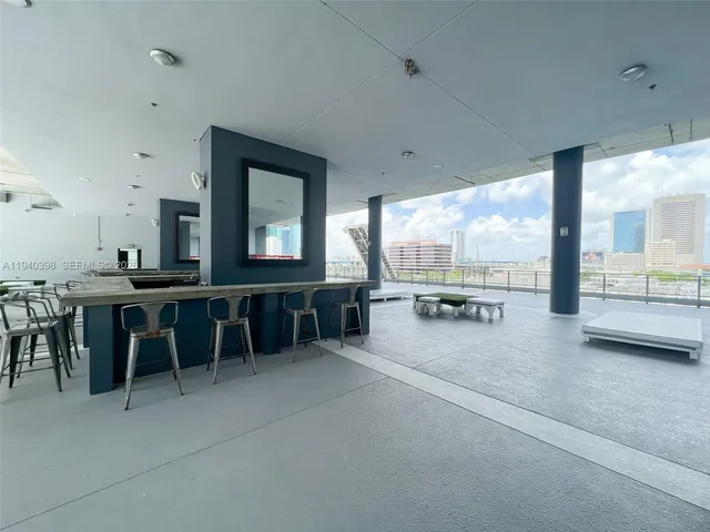 a room with lots of table and chair