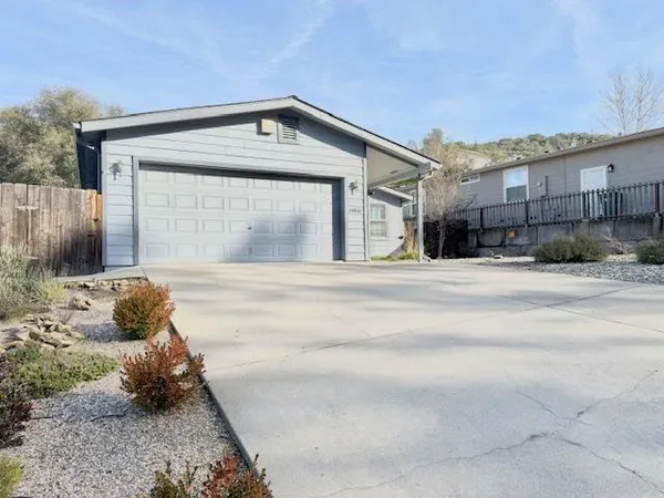 a front view of a house with a outdoor space