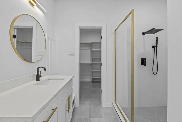 a bathroom with a sink and a mirror