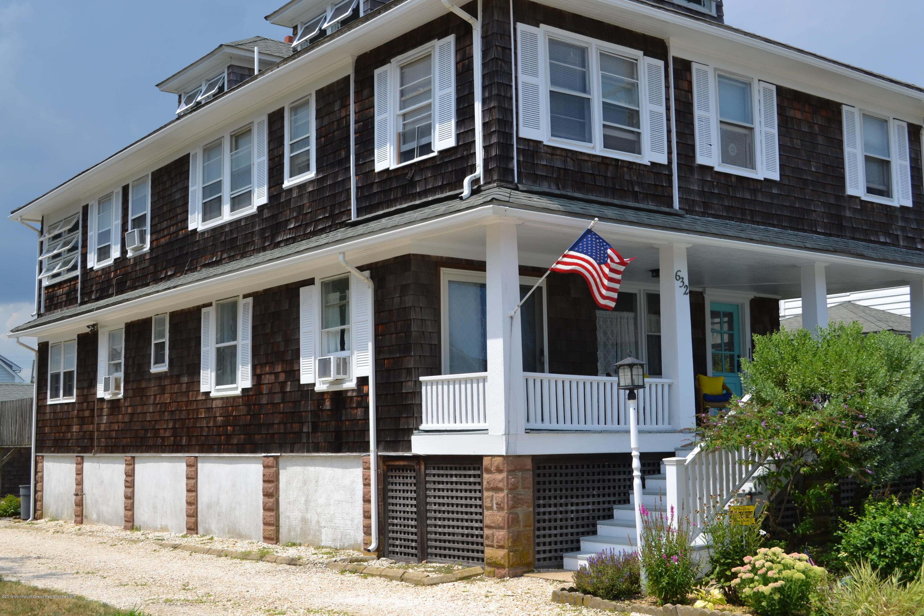 632 Main Avenue, Unit 1 Bay Head, NJ 08742 - Photo 16 of 16 a front view of a house with a yard