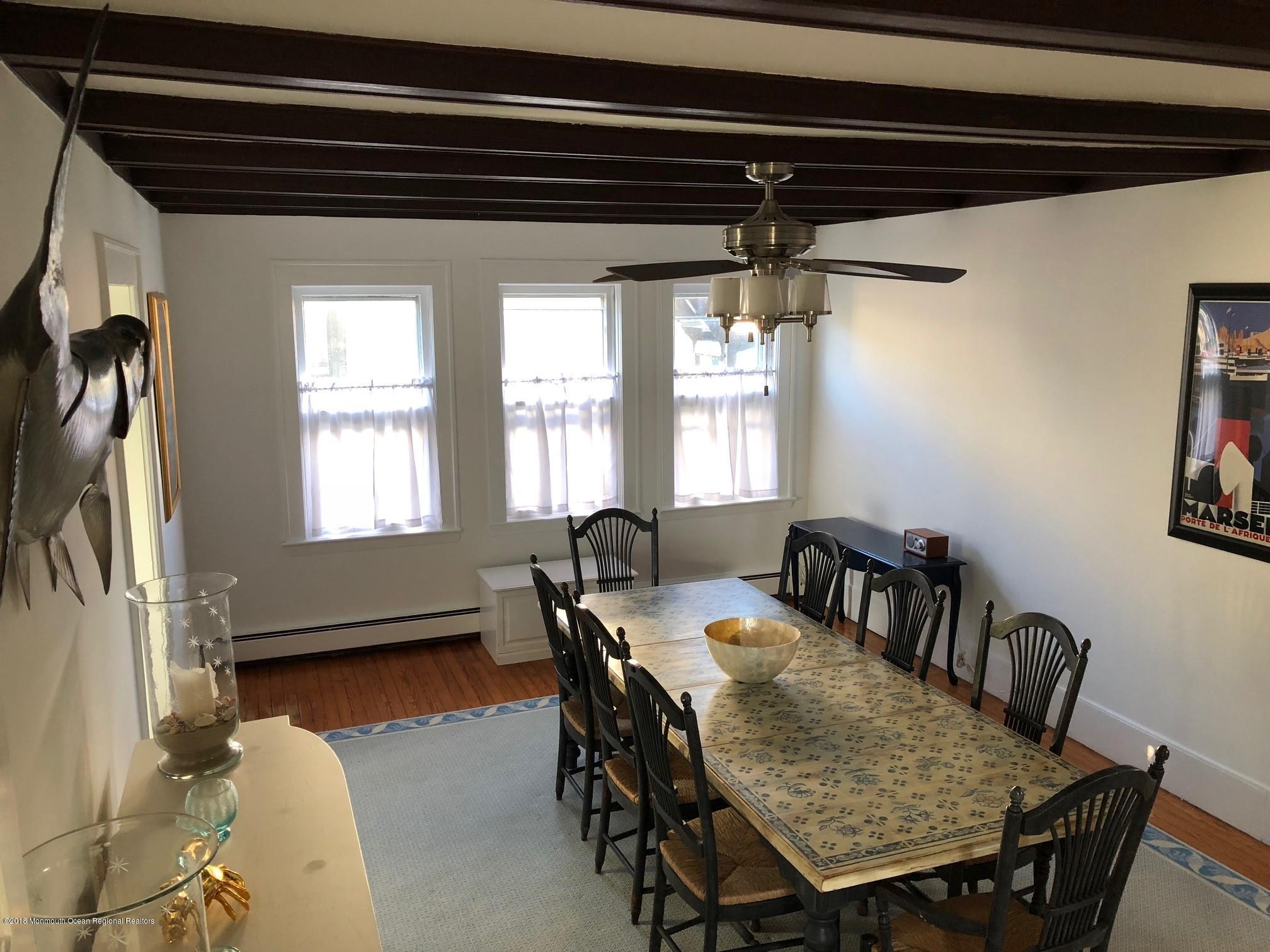 632 Main Avenue, Unit 1 Bay Head, NJ 08742 - Photo 4 of 16 a dining room with furniture and window