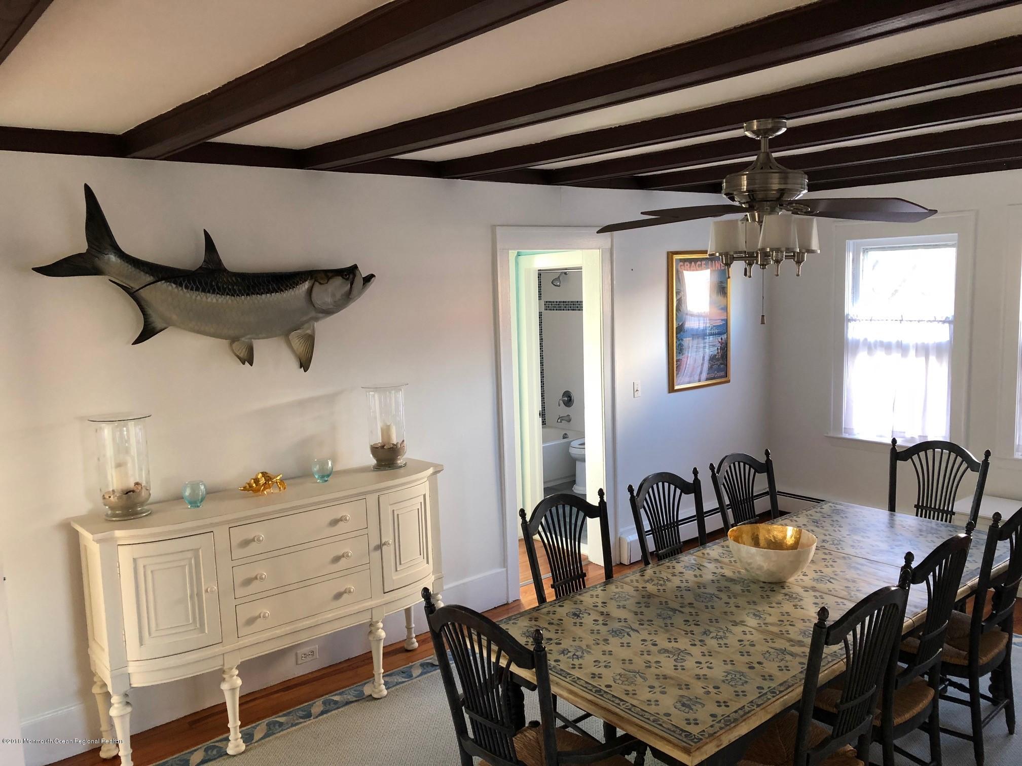 632 Main Avenue, Unit 1 Bay Head, NJ 08742 - Photo 6 of 16 a view of a dining room with furniture