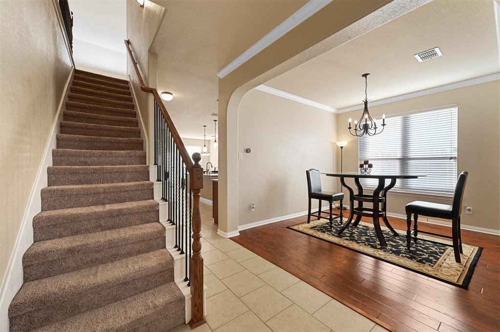 14815 Frisco Ranch Drive Little Elm, TX 75068 - Photo 5 of 40 a view of a dining room with furniture and wooden floor