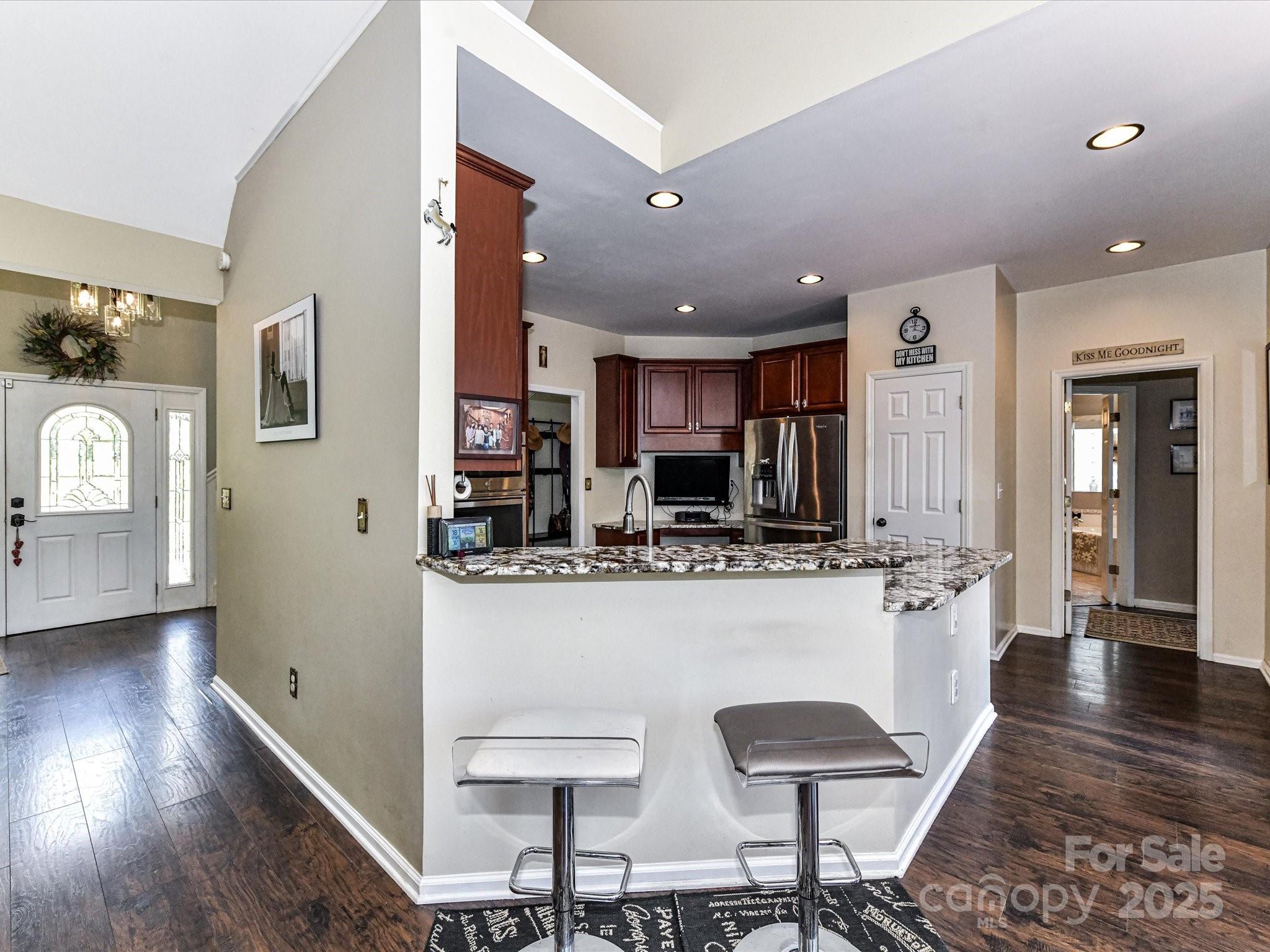 2325 Perry Road Denver, NC 28037 - Photo 14 of 48 a kitchen with stainless steel appliances granite countertop a refrigerator and a stove top oven
