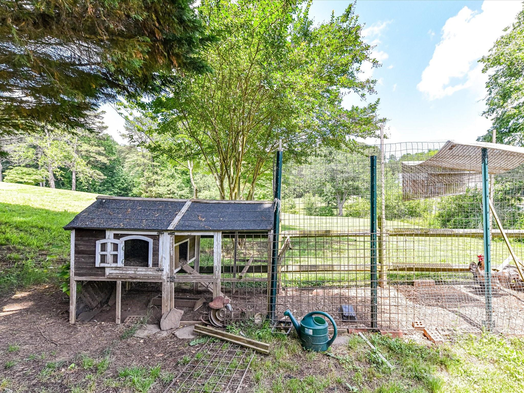 2325 Perry Road Denver, NC 28037 - Photo 42 of 48 a view of a house with a yard and sitting area