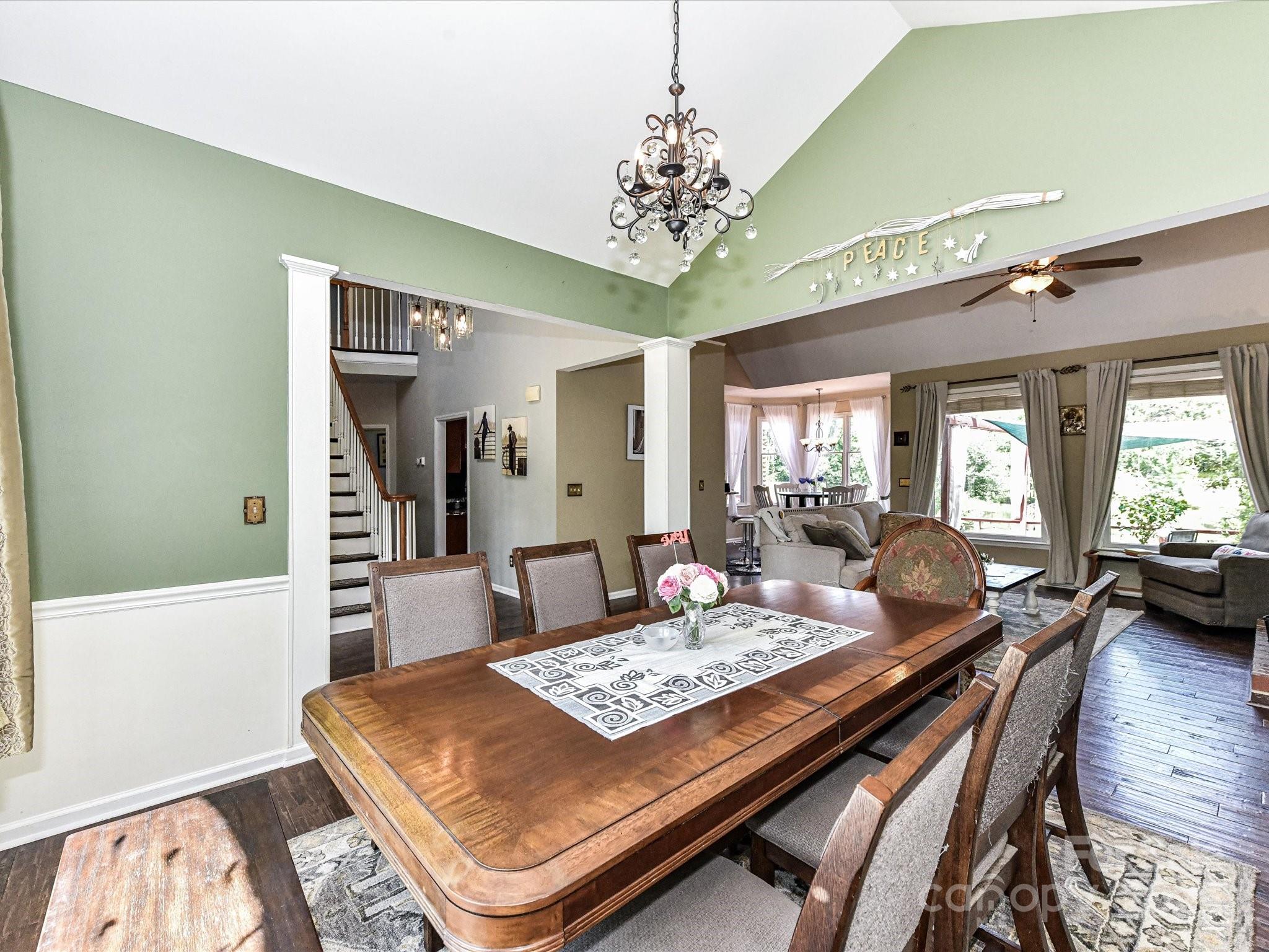 2325 Perry Road Denver, NC 28037 - Photo 10 of 48 a living room with furniture and a chandelier