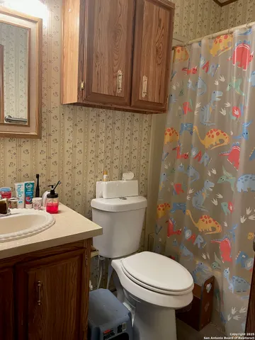 a bedroom with a bed and a closet