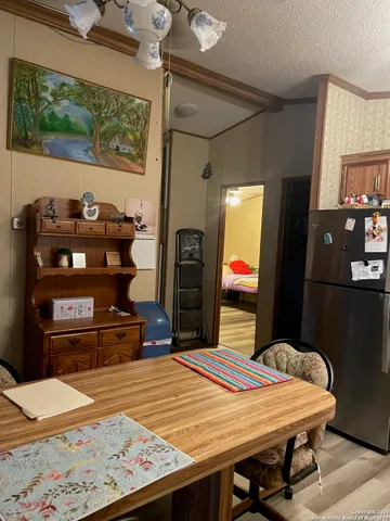 a room with furniture and wooden floor