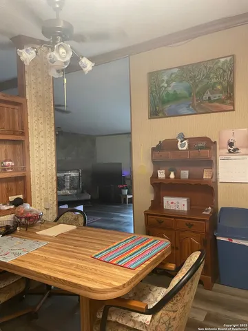 a view of a yard with a tree