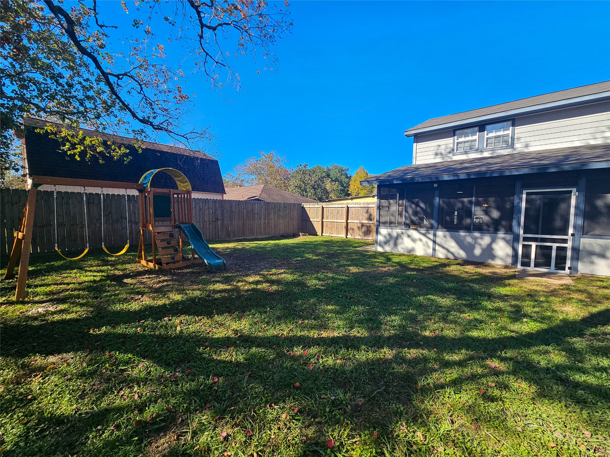 108 Oriole Lane Angleton, TX 77515 - Photo 4 of 20 a view of a house with a yard