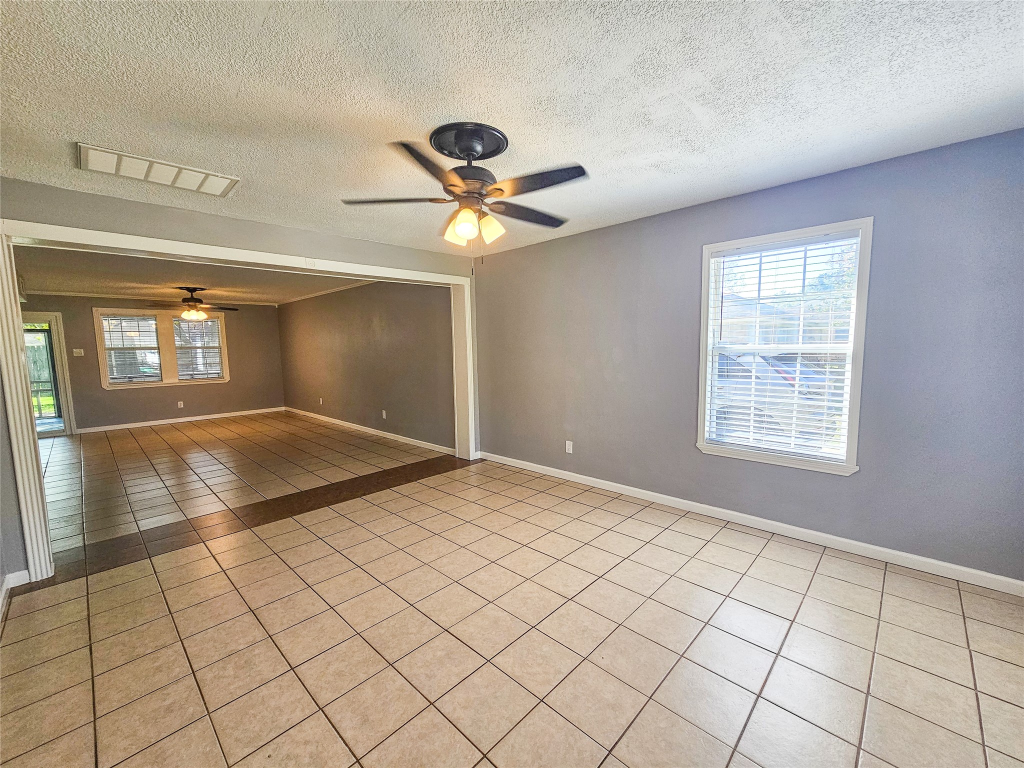108 Oriole Lane Angleton, TX 77515 - Photo 7 of 20 a view of an empty room and window