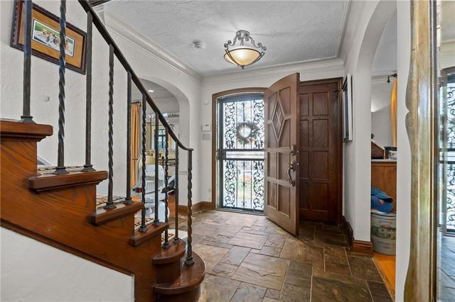 a view of entryway with a front door