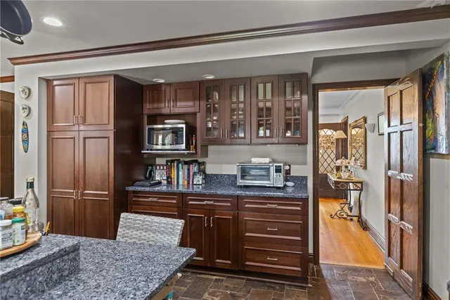 a view of kitchen with wooden floor