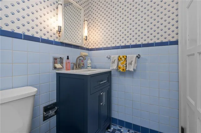 a bathroom with a sink and a toilet