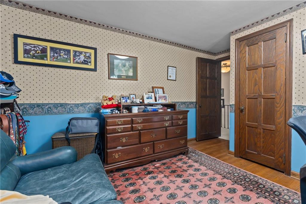 694 Valleyview Road Pittsburgh, PA 15243 - Photo 41 of 50 a room with a couch and a dresser