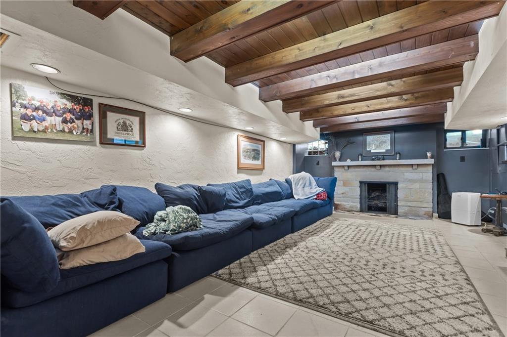 694 Valleyview Road Pittsburgh, PA 15243 - Photo 47 of 50 a living room with furniture and a fireplace